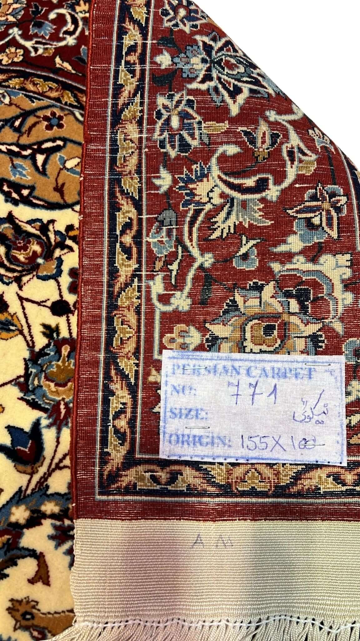 "Backside of a handwoven Seirafian Persian rug, showcasing the detailed silk warp and craftsmanship from Isfahan, Iran."
